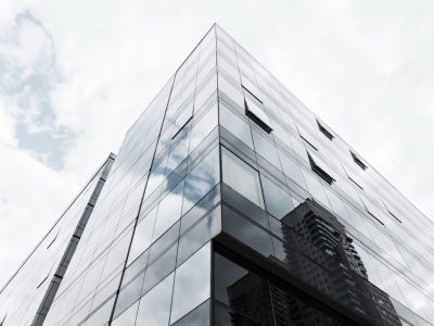 low-angle-view-glass-designed-building